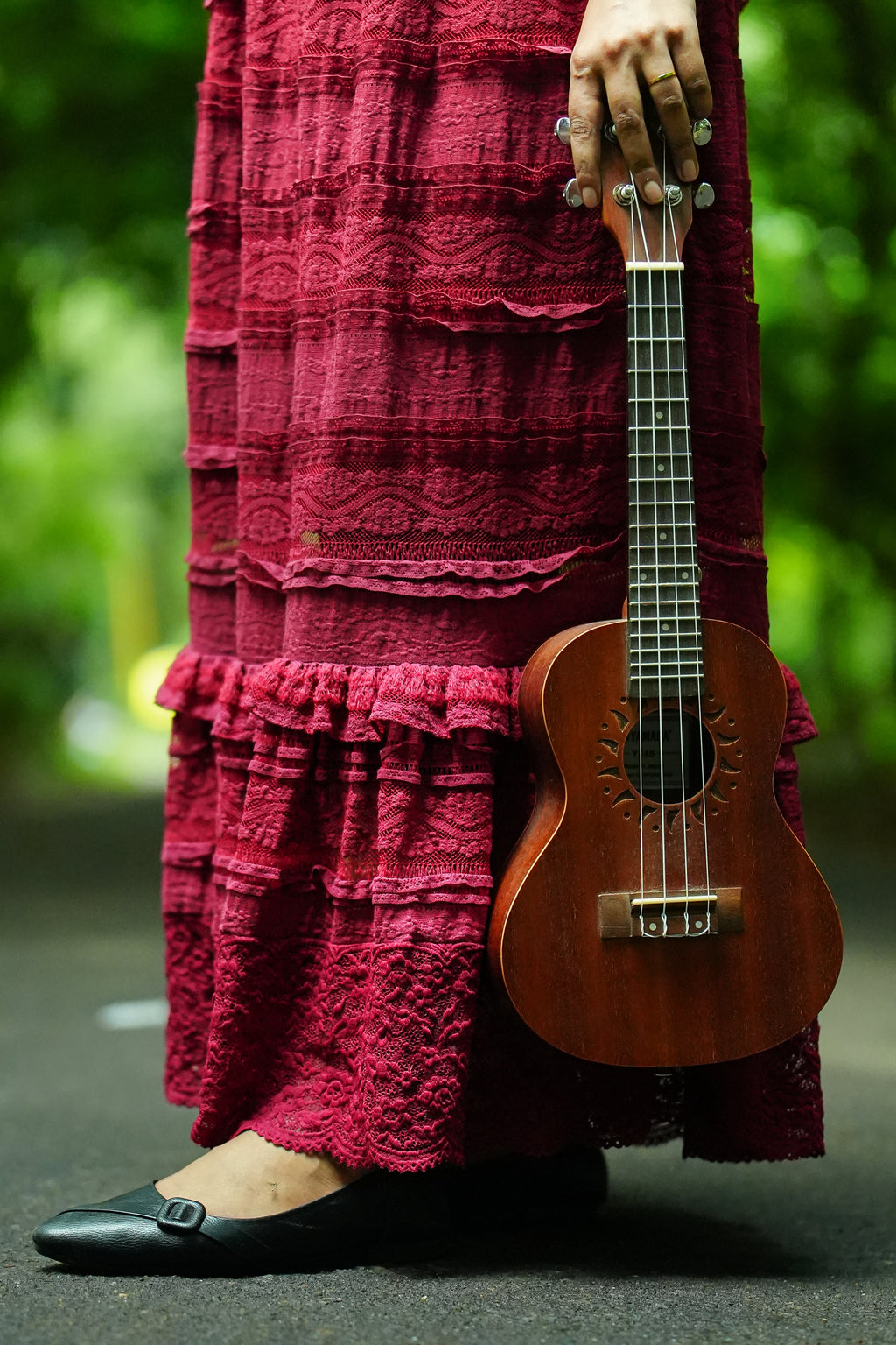 Deep Wine lace gown hem and fabric detail